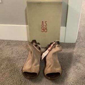 New in box AS98 Gage sandal. Taupe leather with brown straps & details.